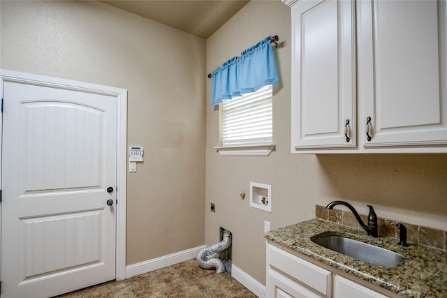 laundry area featuring washer hookup, cabinets, sink, and electric dryer hookup