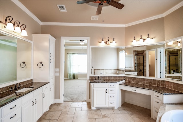 bathroom featuring ornamental molding, ceiling fan, and vanity