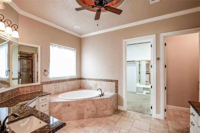 bathroom featuring crown molding, shower with separate bathtub, vanity, and ceiling fan