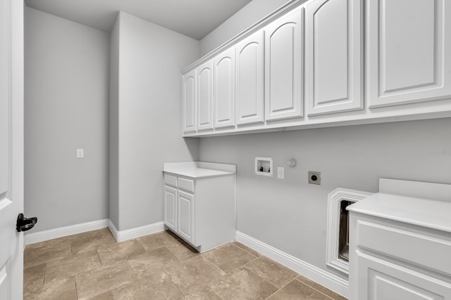 laundry area featuring hookup for a washing machine, hookup for an electric dryer, and cabinets