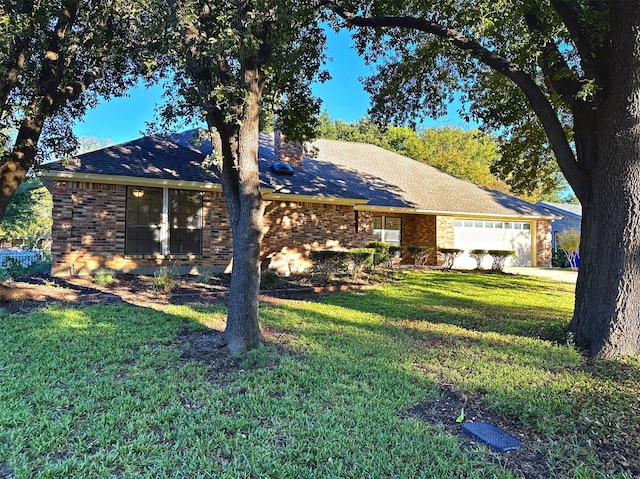 ranch-style house with a front yard