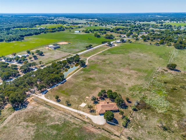 birds eye view of property featuring a rural view