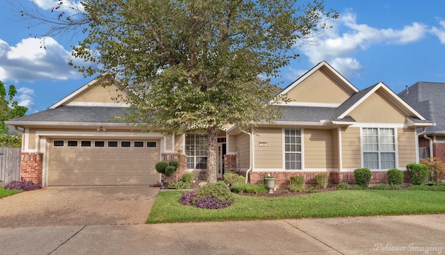 view of front facade featuring a front yard and a garage