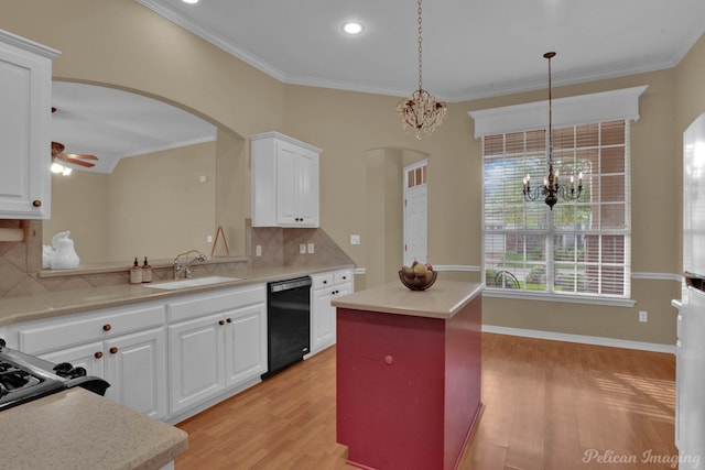 kitchen featuring black dishwasher, sink, backsplash, light hardwood / wood-style floors, and white cabinets