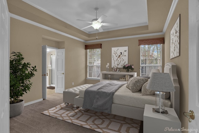 carpeted bedroom with ceiling fan, crown molding, and multiple windows