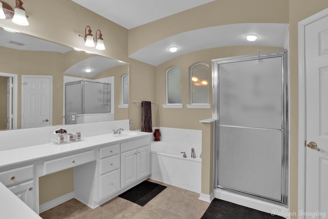 bathroom with vanity and plus walk in shower