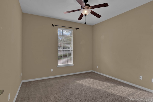 carpeted empty room with ceiling fan