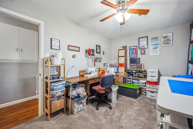 home office with ceiling fan and hardwood / wood-style floors