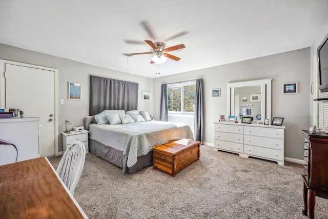 bedroom with ceiling fan and carpet flooring