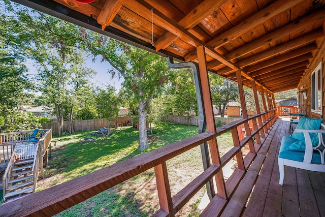 wooden deck with a yard