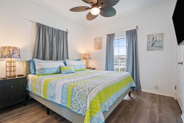 bedroom featuring ceiling fan, ornamental molding, and dark hardwood / wood-style flooring