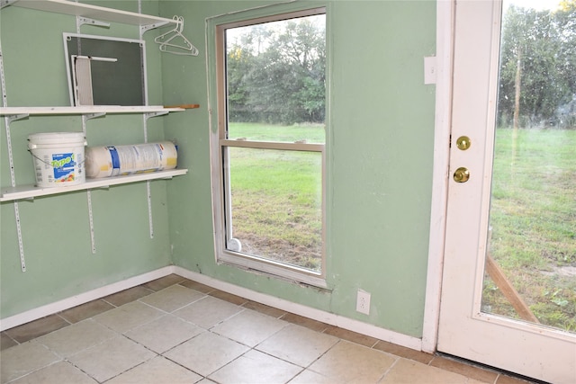 entryway featuring tile patterned flooring