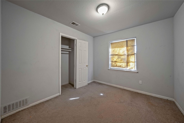 3525 Emerald Dr, Mesquite, TX 75150 - unfurnished bedroom featuring carpet and a closet