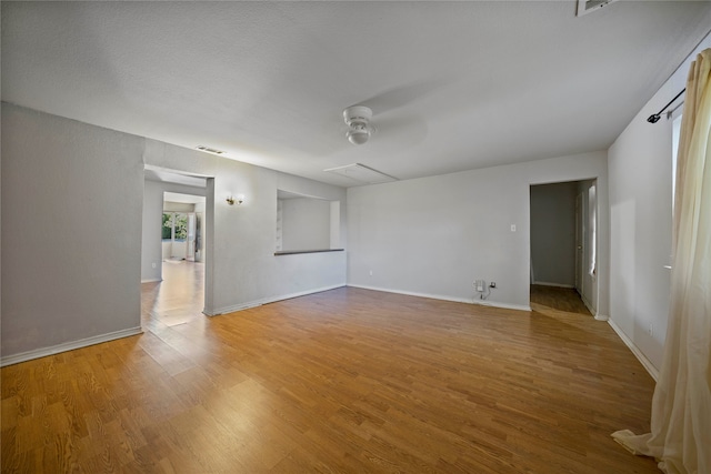 empty room featuring hardwood / wood-style flooring