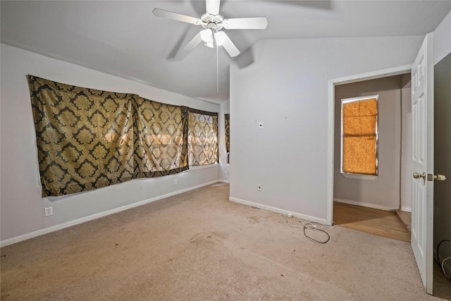 3525 Emerald Dr, Mesquite, TX 75150 - carpeted empty room featuring lofted ceiling and ceiling fan