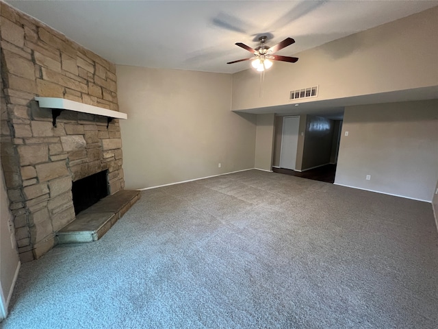 unfurnished living room with carpet floors, a fireplace, and ceiling fan