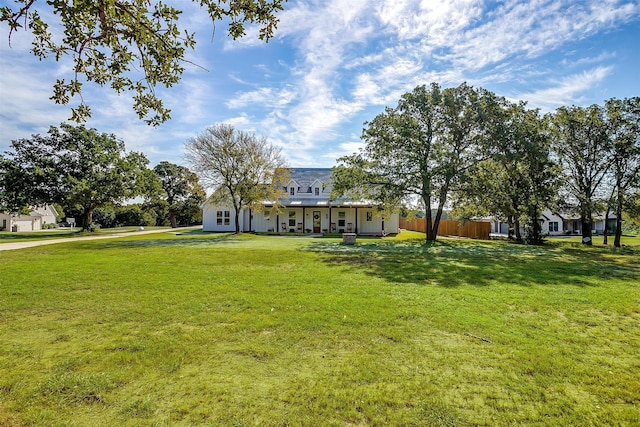 view of front of home with a front lawn