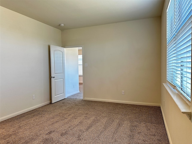 view of carpeted spare room