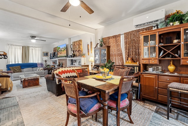 dining room with ceiling fan and a wall mounted air conditioner