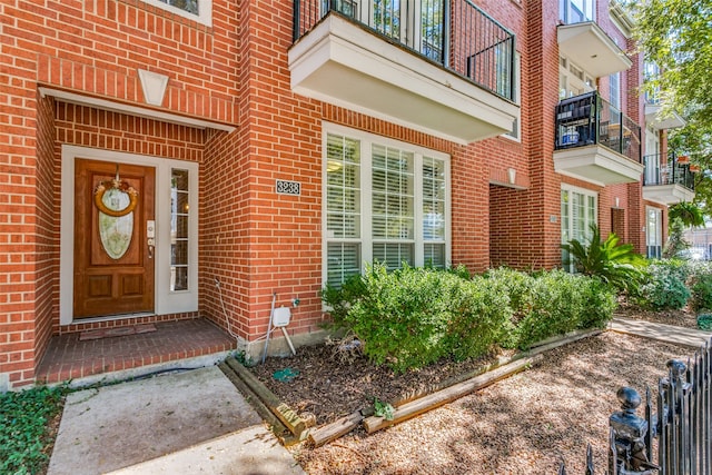 doorway to property with a balcony