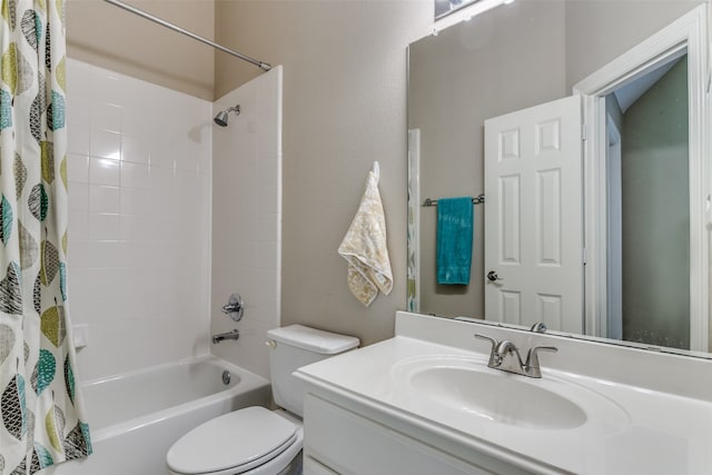 full bathroom with vanity, toilet, and shower / bath combo with shower curtain