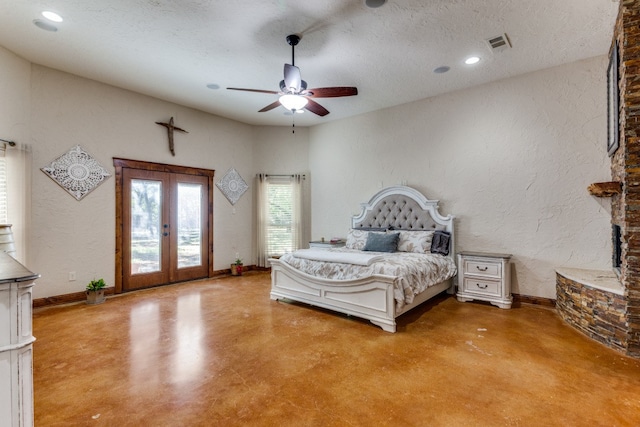 unfurnished bedroom with ceiling fan, a textured ceiling, french doors, and access to exterior