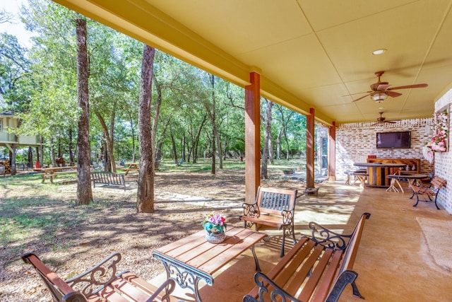 view of patio / terrace featuring ceiling fan