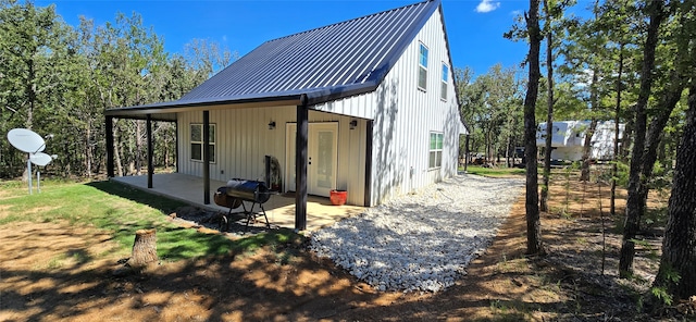 rear view of house with a patio