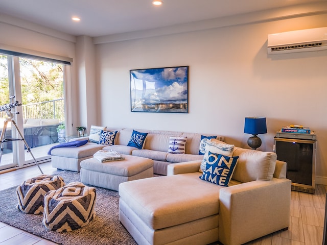 living room with a wall unit AC