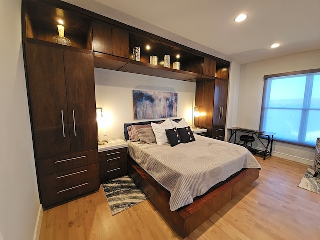 bedroom with light hardwood / wood-style floors