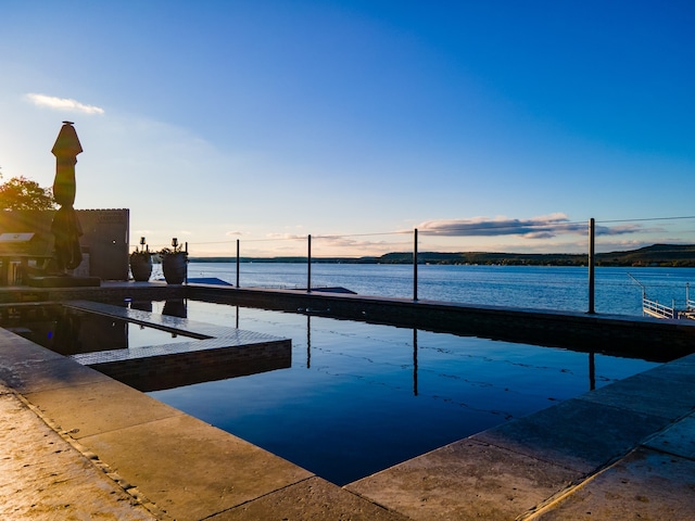 view of dock with a water view