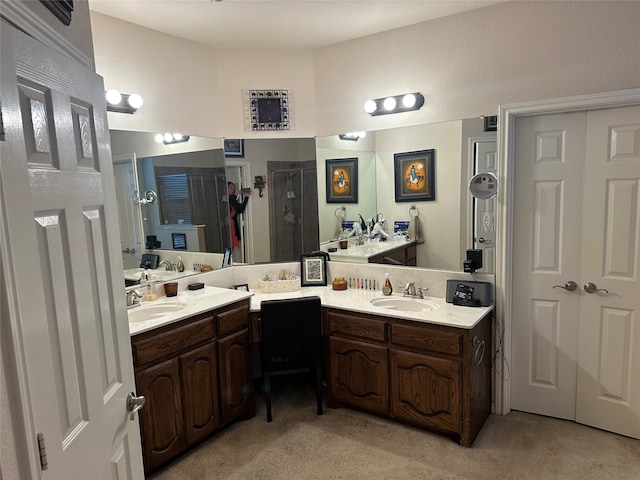 bathroom with vanity and an enclosed shower