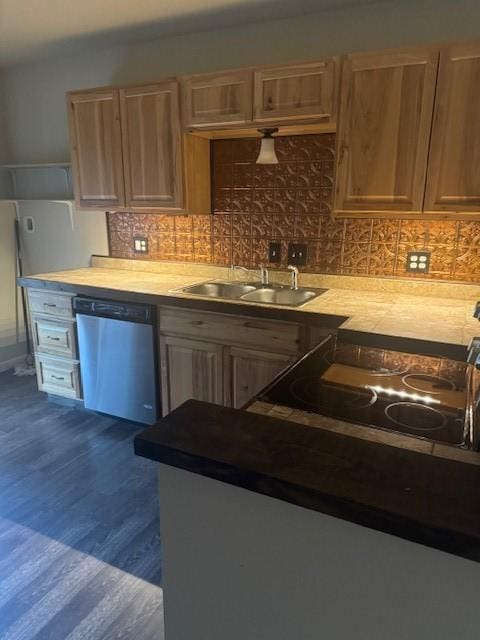 kitchen with dark hardwood / wood-style flooring, decorative backsplash, dishwasher, and sink