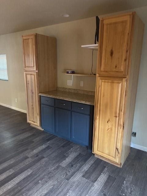 kitchen featuring dark hardwood / wood-style floors