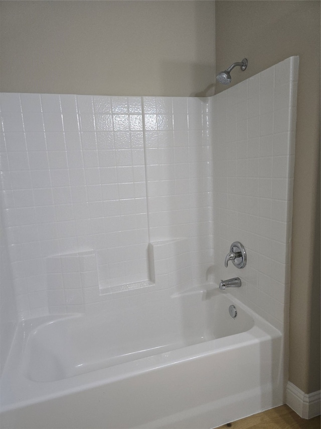 bathroom with shower / tub combination