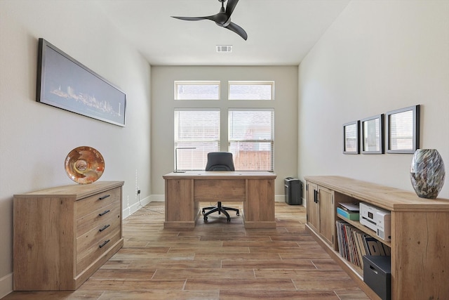 office space featuring hardwood / wood-style floors and ceiling fan