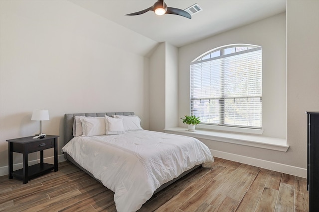 bedroom featuring ceiling fan and wood-type flooring