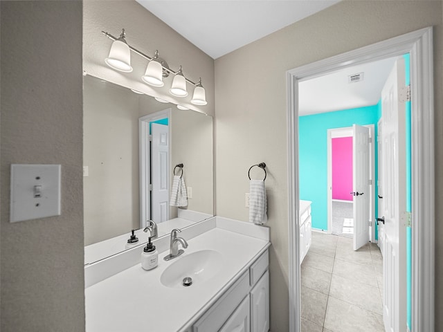 bathroom featuring vanity and tile patterned flooring