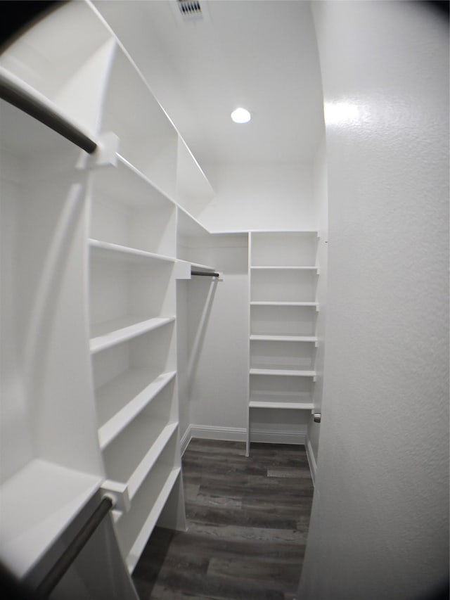 1010 S Preston St, Ennis, TX 75119 - walk in closet with wood finished floors