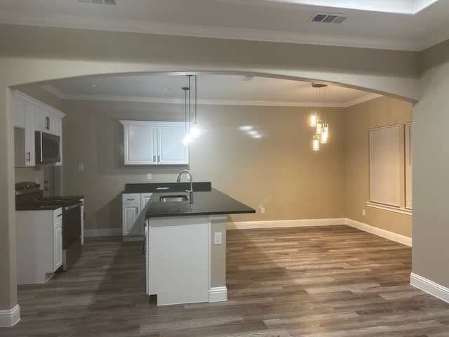 kitchen featuring pendant lighting, dark hardwood / wood-style floors, sink, white cabinetry, and electric range oven