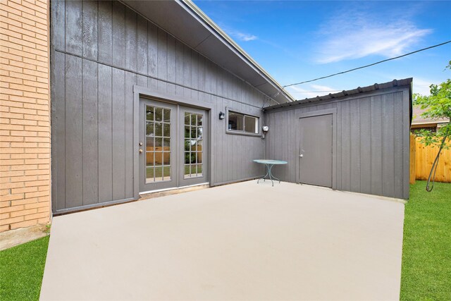 view of patio / terrace featuring a shed