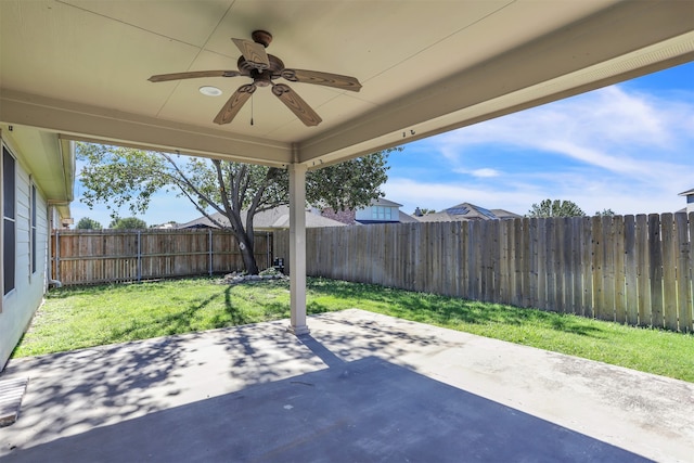 view of patio featuring ceiling fan