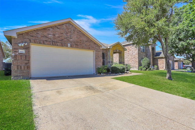 ranch-style house featuring a front lawn and a garage