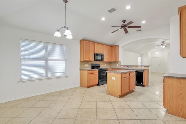 kitchen with lofted ceiling, kitchen peninsula, decorative light fixtures, black appliances, and ceiling fan with notable chandelier