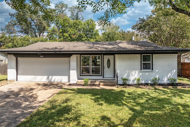 ranch-style house with a front yard and a garage