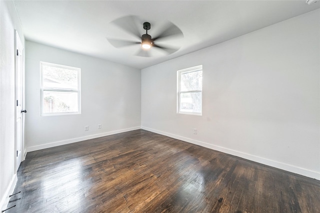 1504 Nichols St, Ennis, TX 75119 - spare room featuring a ceiling fan and dark wood finished floors