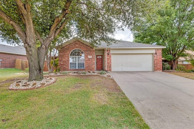 ranch-style home featuring a front yard and a garage