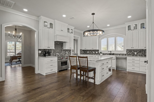kitchen with visible vents, an inviting chandelier, and appliances with stainless steel finishes