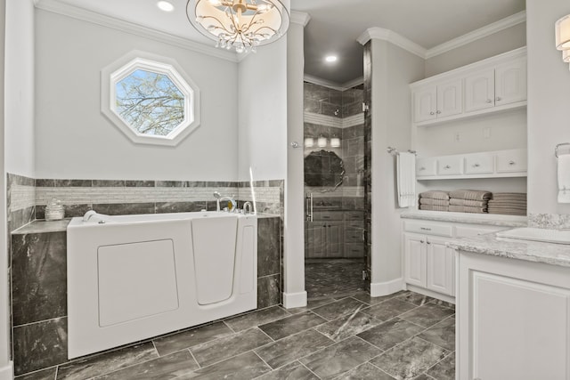 bathroom featuring vanity, crown molding, and a tile shower