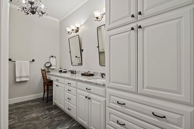 bathroom featuring vanity and crown molding